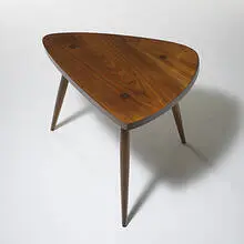 Plank side table by George Nakashima, c. 1955, American black walnut, sold Mar 2006