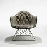 Charles and Ray Eames, LAR-1 armchair, c. 1950, molded plastic, upholstery over foam, zinc