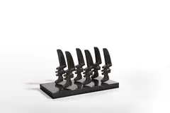 Running Heads by Elizabeth Strong-Cuevas, 1981, Bronze mit schwarzbrauner Patina, auf beschichtete Spanplatte montiert, sold Jun 2025