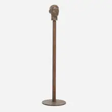 Brown Head by Diana Moore, 1985, cast concrete, steel, sold Mar 2020