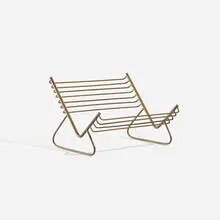 book rack by Carl Auböck, c. 1950, brass, sold Mar 2020