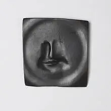 Face (part of the plaque series) by Leonard Baskin, bronze, sold May 2004