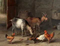 Edgar Hunt, Goats and chickens feeding in a farmyard interior, oil on canvas