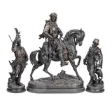 Alfred Barye, & Emile Guillemin (French 1841-1907): A late 19th century French patinated and cold painted spelter Orientalist equestrian group of an Arab huntsman, together with a pair of similar attendant figures, cold painted spelter