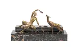 Marcel Bouraine, gilt and shaded bronze model of a satyr and faun