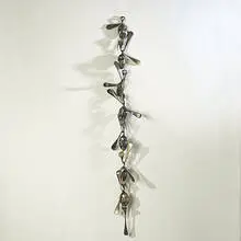 Chain by Moise Habbah, twisted and punctured forks and spoons, sold May 2004