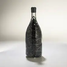 Tape Fall by Christian Marclay, 1990, glass bottle, magnetic tape, sold May 2004