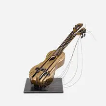 Violin by Arman, 2002, patinated bronze, sold Mar 2020