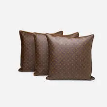 pillows, set of three by Louis Vuitton, leather, upholstery, sold Mar 2020