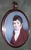 English School, A Gentleman, wearing brown coat over white waistcoat and tied cravat, oval yellow metal frame, the rear with initials 'JAD' and arranged hair,