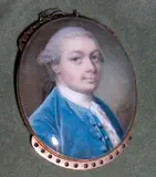 Samuel Cotes, A Gentleman, wearing blue coat with matching waistcoat over frilled white cravat, his powdered hair worn en queue, signed on the obverse with initials and dated 'SC/ 1763' ,yellow metal oval frame with bracelet clasp attachments,