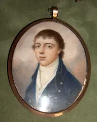 Thomas Peat, A Gentleman, wearing blue coat with silver buttons over white waistcoat and tied white cravat, oval yellow metal frame,