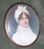 English School, A Lady, wearing white dress with high ruffled collar, her brown hair upswept beneath a knotted white turban, yellow metal oval frame, the rear with arranged hair,
