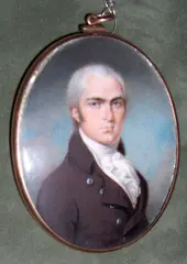 A Gentleman, wearing brown coat with silver buttons over frilled white cravat, oval yellow metal frame, the rear with arranged hair, by Philip Jean, offered Sep 2020