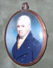 Charles Hardy, A Gentleman, wearing blue coat with brass buttons over cream waistcoat and tied white stock, signed and dated 1802, yellow metal oval frame, the rear with initials 'AB'
