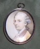 Ra Jeremiah Meyer, A Gentleman, wearing yellow coat with brown collar over tied white cravat, his hair curled and powdered and worn en queue, silver gilt oval frame,