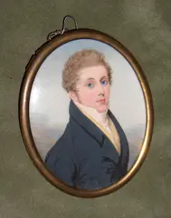 Frederick Buck, A Gentleman, wearing blue coat over cream waistcoat and tied white stock, Signed and dated Fk Buck/ 1800, gilt-metal oval frame,