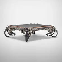 Monumental coffee table by Albert Paley, 1999, formed, fabricated, and enameled steel, copper, cleft slate, sold Nov 2019