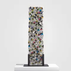 Arman, Stele, 2004, accumulation of paint tubes and acrylic in Plexiglas
