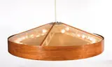 John Lautner, Hanging light, Constructed of maple and steel with an inverted disc shade and 4 perforated steel inserts which create a pattern on the ceiling