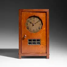 Mantel clock by Gustav Stickley, c. 1912, oak, brass, leaded glass, sold Sep 2026