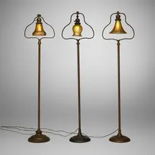 Handel, Collection of three floor lamps, c. 1915, bronzed metal, patinated brass, hand-blown glass, hand-blown Aurene glass