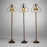 Handel, Collection of three floor lamps, c. 1915, bronzed metal, patinated brass, hand-blown glass, hand-blown Aurene glass