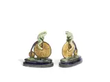 'Bicyclist': A Glazed Stoneware Model of a Frog on a Penny Farthing Bicycle by George Tinworth For Doulton Lambeth, circa 1885, glazed in tones of green, brown and blue, on an oval base, sold Aug 2020