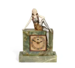 Ferdinand Preiss, An Art Deco Cold-Painted, Carved Ivory and Onyx Figural Clock, circa 1925