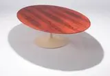 Oval rosewood coffee table by Eero Saarinen, c. 1956, Knoll, sold Jun 2007