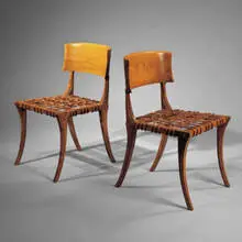 Klismos chairs, pair by T. H. Robsjohn-Gibbings, 1961, Greek walnut, leather, sold Oct 2001