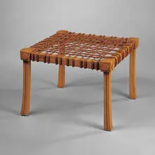 Diphros stool by T. H. Robsjohn-Gibbings, 1961, Greek walnut, leather, sold Oct 2001