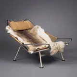 Hans J. Wegner, Flag Halyard lounge chair, 1950, flagline, chrome-plated and enameled steel