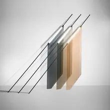 Bec Brittain, Flags from the Resolute series, set of three, 2017, peach, gray, and bronze glass, oil-rubbed bronze, LED bulbs