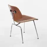 DCM by Charles and Ray Eames, c. 1946, walnut, steel, sold Oct 2001