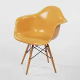 Dowel leg chair by Charles and Ray Eames, 1950, fiberglass, birch, metal, sold Oct 2001