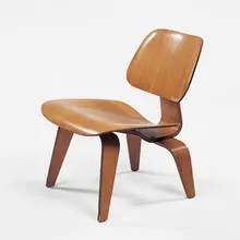 LCW by Charles and Ray Eames, 1945, walnut, sold Oct 2001