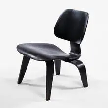 LCW by Charles and Ray Eames, 1945, walnut, sold Oct 2001
