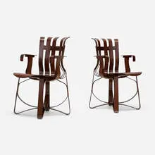 Hat Trick armchairs, pair by Frank Gehry, stained laminated maple, sold Mar 2026