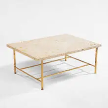 coffee table by Harvey Probber, 1950s, fossilized limestone, brass, sold Oct 2001