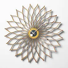 Sunflower clock, model 2261 by George Nelson, 1958, plywood, brass, sold Oct 2001