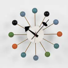 Ball clock, model #4755 by George Nelson & Associates, 1948, lacquered wood, brass, sold Oct 2001