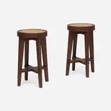 High stools from the Scientific Block, Punjab University, Chandigarh, pair by Pierre Jeanneret, c. 1965-66, teak, cane, sold Mar 2026