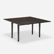 Drop-leaf table from the Mr. and Mrs. George Clifford Residence, Hope Ranch, CA by William 'Billy' Haines, c. 1956, stained oak, copper inlay, sold Nov 2025