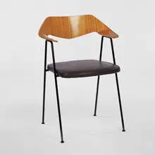 armchair by Robin Day, 1950s, mahogany veneer, birch, steel, upholstery, sold Oct 2001