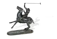 Yves Benoist-Gironière, Polo Player, Bronze figure of a polo player on pony with stick aloft, about to strike the ball, raised on naturalistic plinth base