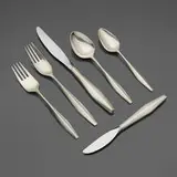 Gio Ponti, Early Diamond flatware set, 1958, sterling silver, stainless steel