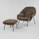 Womb chair by Eero Saarinen, 1948, steel, upholstered fiberglass, sold Oct 2001