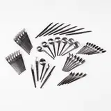 flatware by Arne Jacobsen, 1957, stainless steel, sold Oct 2001