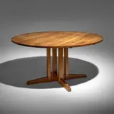Round Cluster Base dining table by George Nakashima, 1966, American black walnut, sold Nov 2025